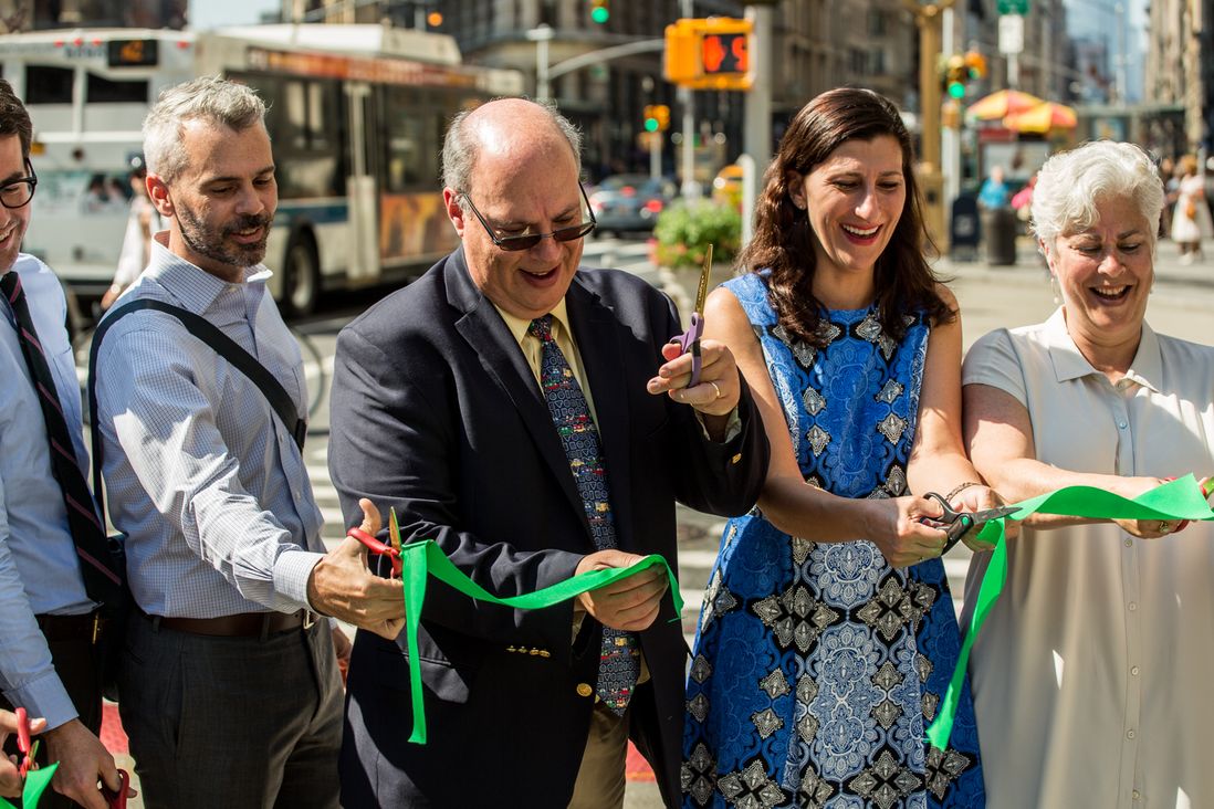 City officials and local business leaders cut a ceremonial ribbon  at the opening of the Shared Streets area.</br>